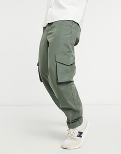 Свободные брюки карго цвета хаки ASOS DESIGN-Зеленый