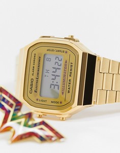 Золотистые цифровые часы со значком "Wonder Woman" Casio-Золотистый