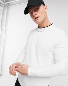 Белый лонгслив с ворсистой поверхностью и логотипом по центру Calvin Klein