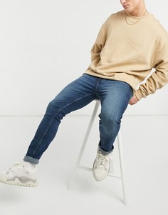 Выбеленные зауженные джинсы с зеленоватым отливом ASOS DESIGN-Голубой
