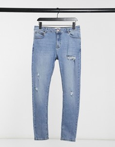 Синие эластичные джинсы с эффектом винтажного стиля, потертостями и рваной отделкой ASOS DESIGN-Голубой