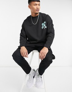 Черный свободный лонгслив с принтом в виде листьев ASOS DESIGN