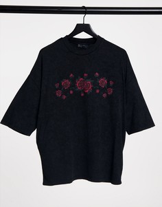 Черная футболка в стиле oversized с принтом роз спереди и эффектом кислотной стирки ASOS DESIGN-Черный