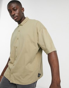 Рубашка в стиле oversized из плотного трикотажа цвета выбеленного хаки на пуговицах ASOS DESIGN-Зеленый