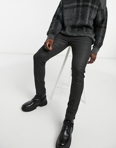 Зауженные черные джинсы с покрытием и декоративными швами ASOS DESIGN-Черный цвет
