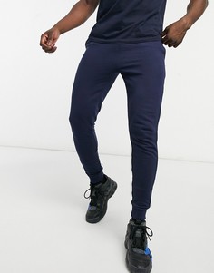 Темно-синие джоггеры скинни из органического хлопка ASOS DESIGN-Темно-синий