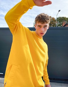 Желтый свитшот с разрезом спереди ASOS DESIGN