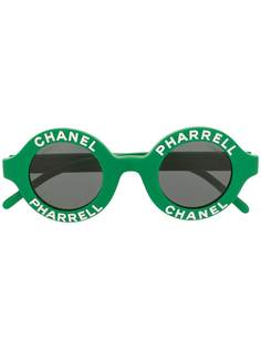 Chanel Pre-Owned солнцезащитные очки Pharell в круглой оправе с логотипом CC