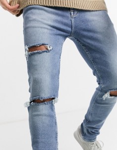 Светлые эластичные джинсы скинни с винтажным эффектом потертости и рваной отделкой ASOS DESIGN-Голубой