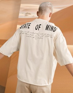 Oversized-футболка бежевого цвета с рваной отделкой и надписью на спине и карманах ASOS DESIGN-Бежевый