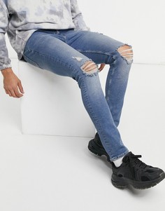 Синие зауженные джинсы с рваной отделкой ASOS DESIGN-Голубой