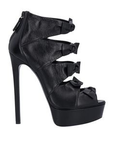 Полусапоги и высокие ботинки Casadei