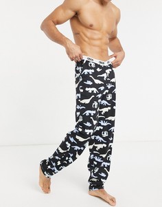 Черные штаны для дома с ярким принтом динозавров ASOS DESIGN-Черный цвет