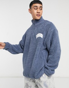 Плюшевый oversized-свитшот с короткой молнией и накладным логотипом "Ohio" в студенческом стиле ASOS DESIGN-Голубой