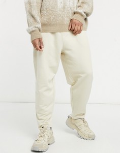 Бежевые суженные книзу джоггеры в стиле oversized ASOS DESIGN-Бежевый