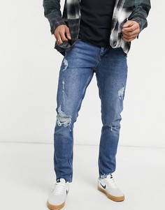 Темно-выбеленные узкие джинсы со рваной отделкой ASOS DESIGN-Голубой