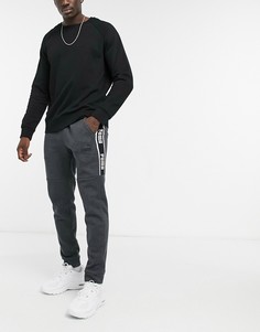 Серые флисовые брюки Puma Amplified-Серый