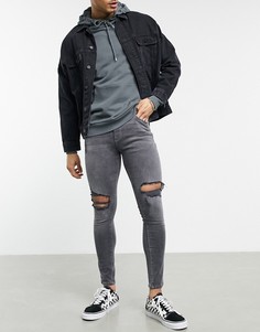 Супероблегающие джинсы выбеленного черного цвета из эластичной ткани со рваной отделкой ASOS DESIGN-Черный цвет