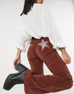 Расклешенные вельветовые брюки кремового цвета с яркими звездами на карманах Free People-Кремовый