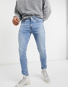 Светлые выбеленные супероблегающие джинсы Levis Youth 519-Голубой Levis®
