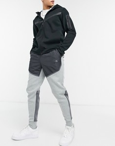 Серые флисовые джоггеры в дизайне колор блок Nike Tech Fleece-Серый