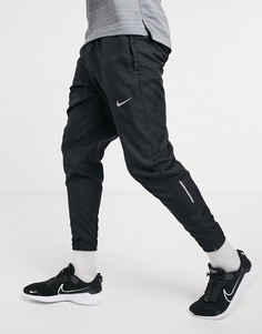 Купить мужские брюки Nike Running в интернет-магазине Lookbuck