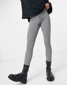 Купить женские зауженные брюки из плотной ткани в интернет-магазине Lookbuck