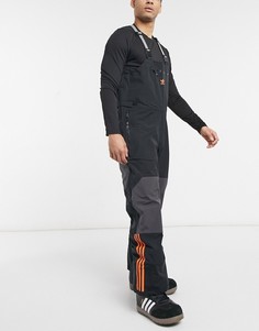 Черные зимние брюки-комбинезон adidas Snowboarding 3L-Черный цвет