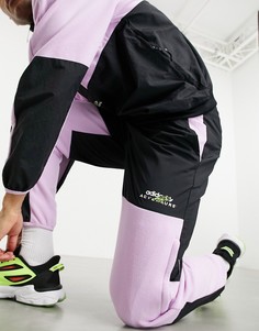 Флисовые джоггеры черного и сиреневого цветов от комплекта adidas Originals-Черный цвет