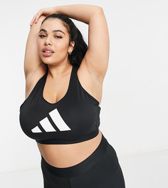 Черный бюстгальтер со спиной-борцовкой и тремя фирменными полосками adidas Training Plus-Черный цвет