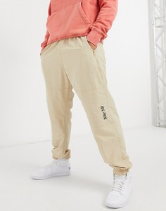 Спортивные брюки светло-песочного цвета с манжетами и логотипом Nike SB Classic-Бежевый