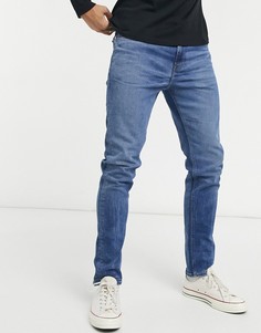 Темно-голубые облегающие джинсы с эффектом потертости ASOS DESIGN-Синий