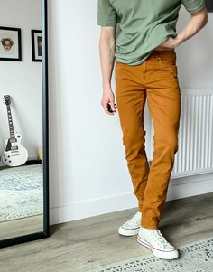 Джинсы скинни горчичного цвета ASOS DESIGN-Желтый