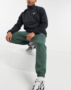 Джоггеры цвета хаки с манжетами в стиле casual Nike Club-Зеленый