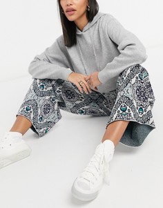 Кремовые трикотажные брюки с широкими штанинами и разноцветным принтом Free People Sun In The West-Кремовый