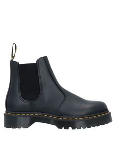 Полусапоги и высокие ботинки Dr. Martens