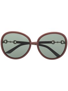 Gucci Eyewear солнцезащитные очки Jackie-O в оправе с декором Horsebit