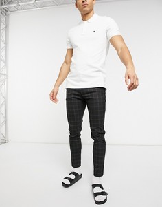Черные супероблегающие брюки в клетку ASOS DESIGN-Черный цвет