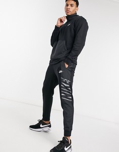 Черные джоггеры с манжетами Nike Hybrid-Черный цвет