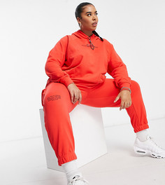 Красные флисовые джоггеры с логотипом-галочкой Nike Plus-Красный