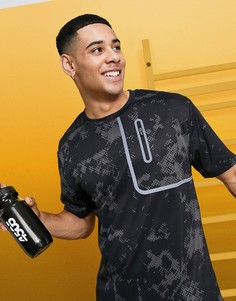 Спортивная футболка свободного кроя со сплошным принтом и карманом ASOS 4505-Черный цвет
