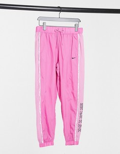 Розовые тканые брюки с окантовкой Nike-Розовый
