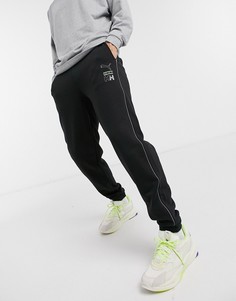 Черные спортивные штаны с полосками и логотипом PUMA x Helly Hansen-Черный цвет