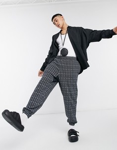 Oversized-джоггеры черного цвета с принтом «Чикаго» по всей поверхности ASOS DESIGN-Черный цвет