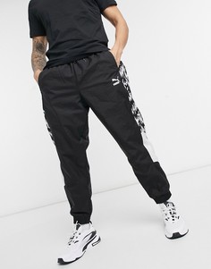 Черные спортивные брюки со сплошным принтом PUMA TFS OG-Черный цвет