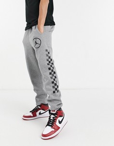Серые джоггеры с манжетами Nike Jordan Sport DNA-Серый