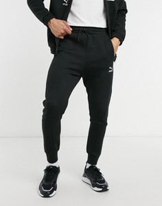 Черные спортивные брюки с логотипом PUMA International-Черный цвет