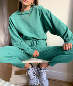 Зеленый спортивный костюм в стиле oversized из свитшота с подплечниками и свободных джоггеров ASOS DESIGN-Зеленый цвет