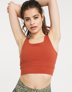 Красно-бурый кроп-топ Nike Yoga Luxe-Оранжевый цвет