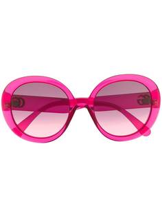 Gucci Eyewear солнцезащитные очки в круглой оправе с логотипом GG